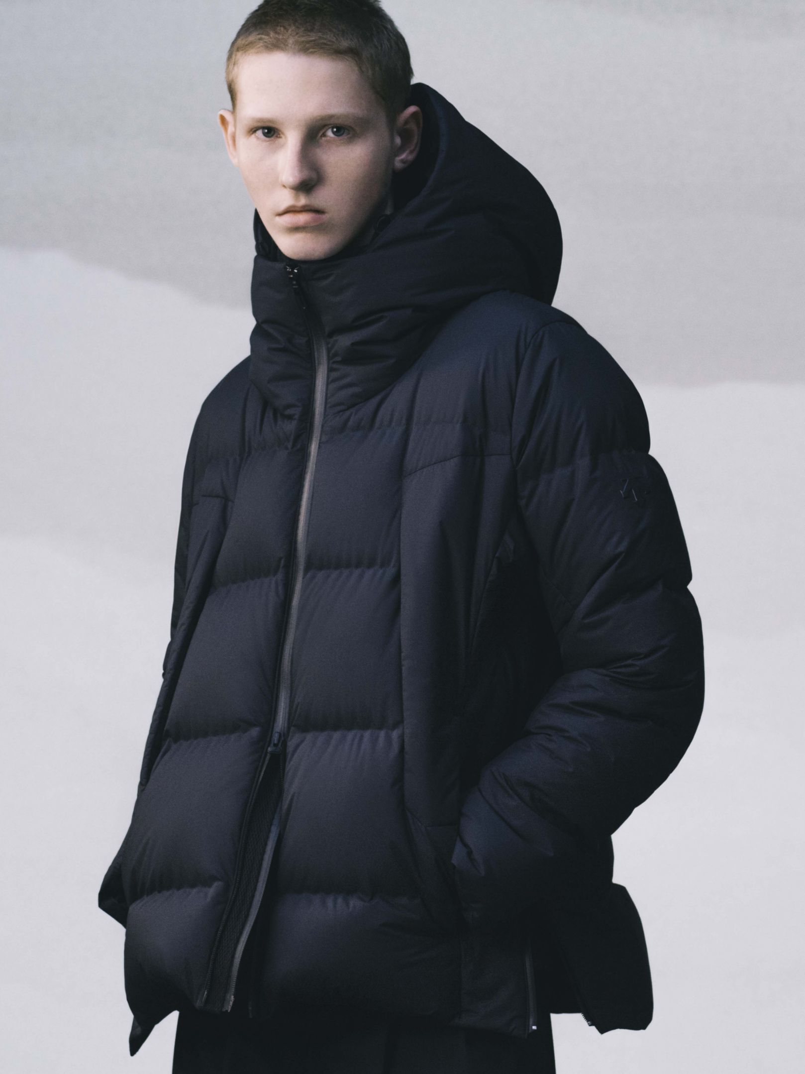 Down jacket with heat welded seams